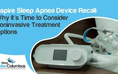 Image of sleep apnea therapy setup with CPAP machine and mask, featuring Sleep Better Columbus and highlighting "Inspire Sleep Apnea Device Recall: Why It’s Time to Consider Noninvasive Treatment Options," aligning with the message of exploring alternative therapies.