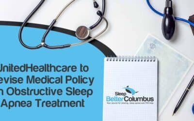 Image of medical tools and policy documents on a desktop in a hospital, featuring Sleep Better Columbus and highlighting "UnitedHealthcare to Revise Medical Policy on Obstructive Sleep Apnea Treatment."